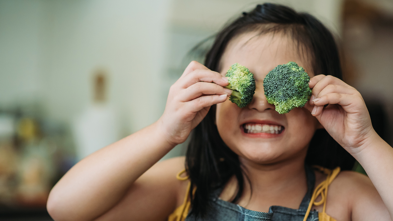 girl with broccoli.jpg