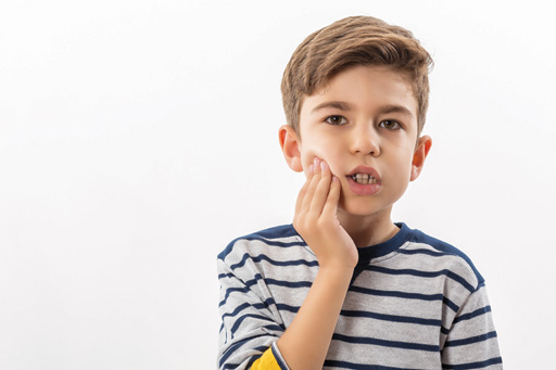 child with tooth pain copy.jpg